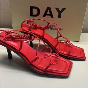 Elegant Red Stiletto Heels with Strappy Design